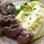 Troskinta jautiena su bulviu kose
